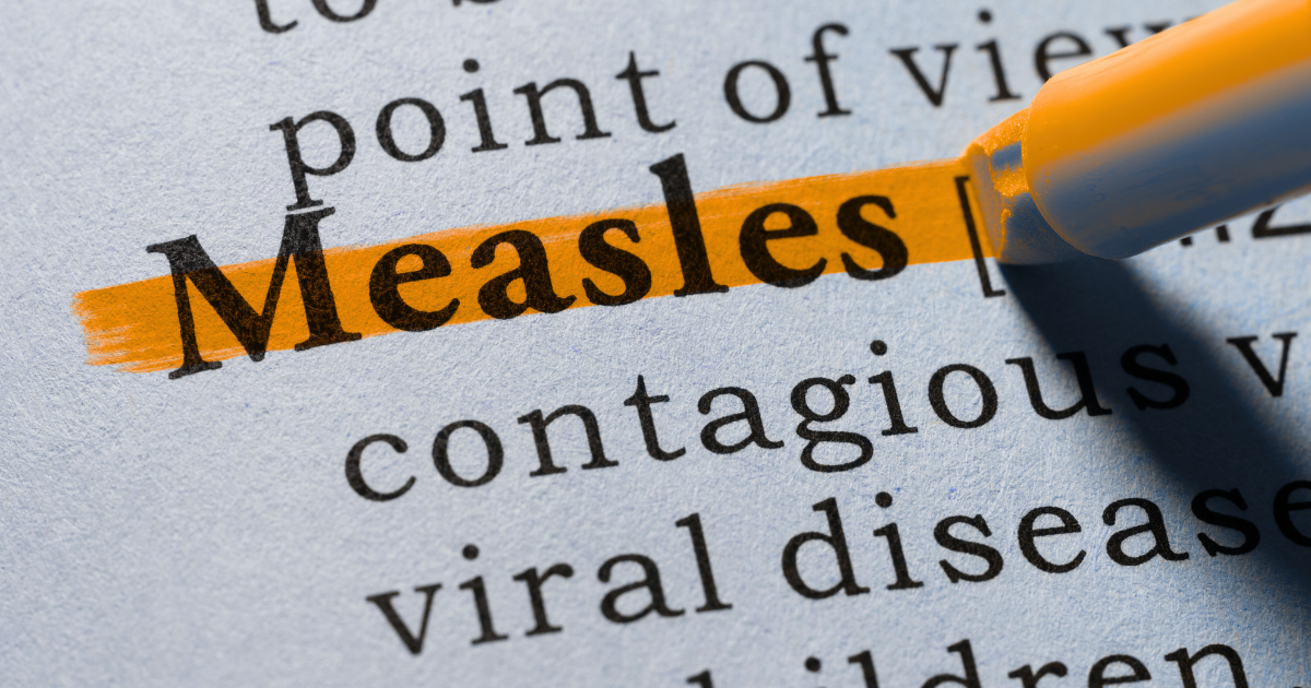 Early symptoms of measles include fever, cough, runny nose, red eyes, and a skin rash.