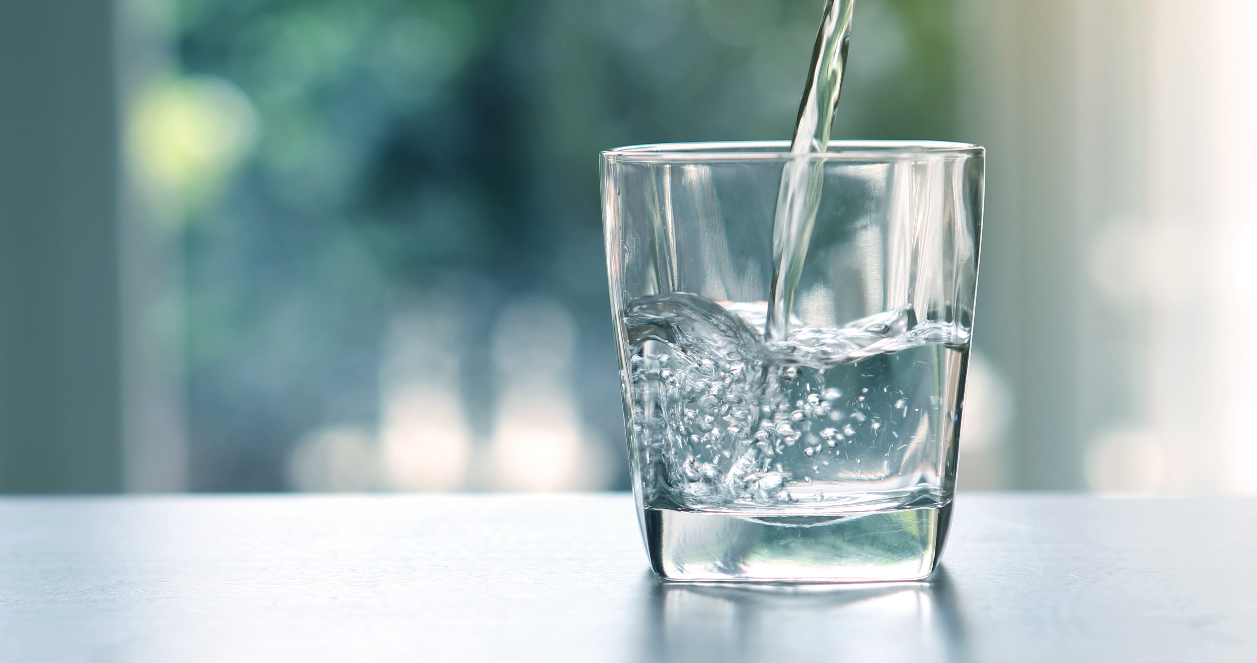 Healthy New Years Resolutions include drinking water more often.
