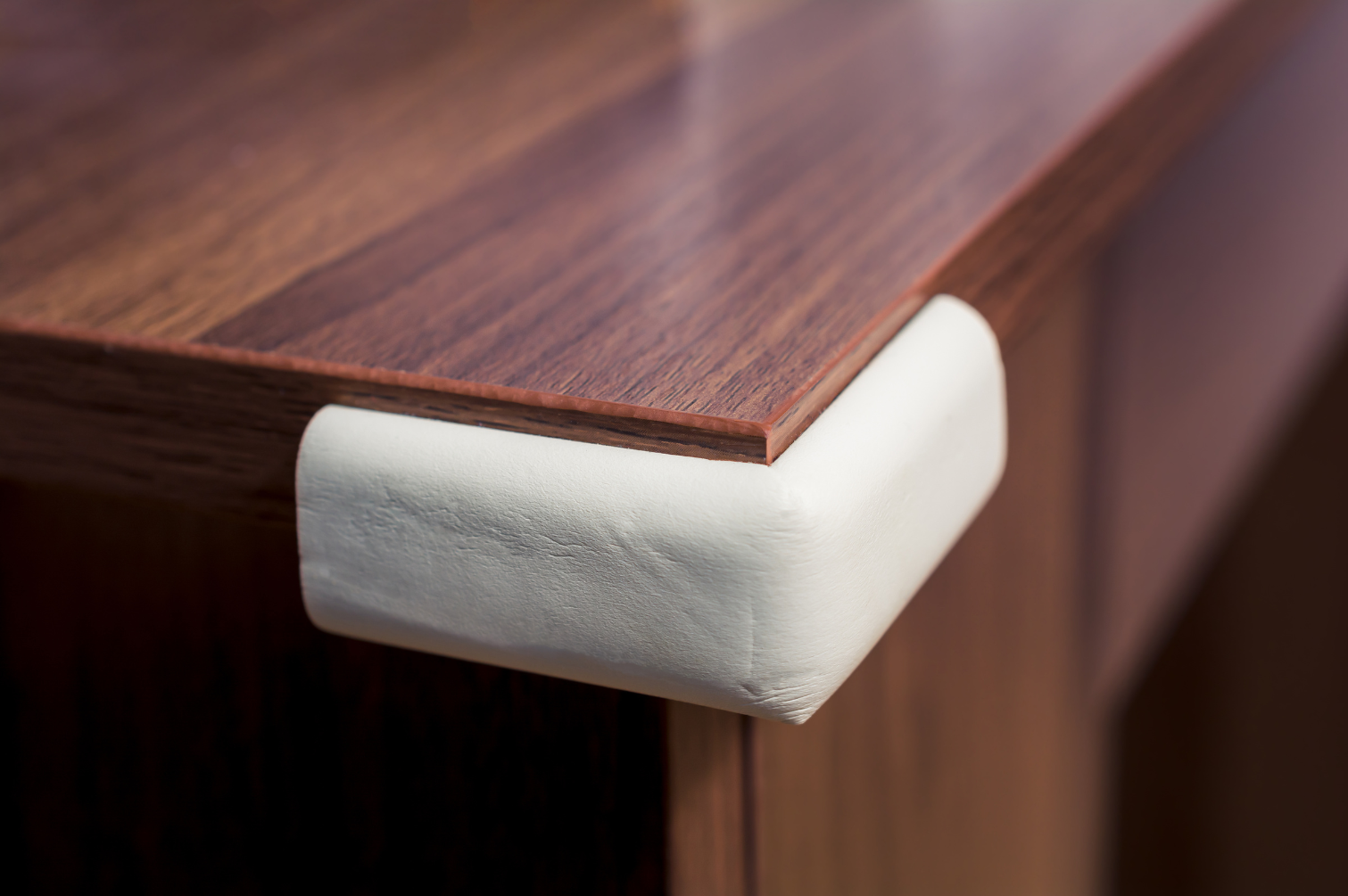 Foam corner protectors on table for baby-proofing