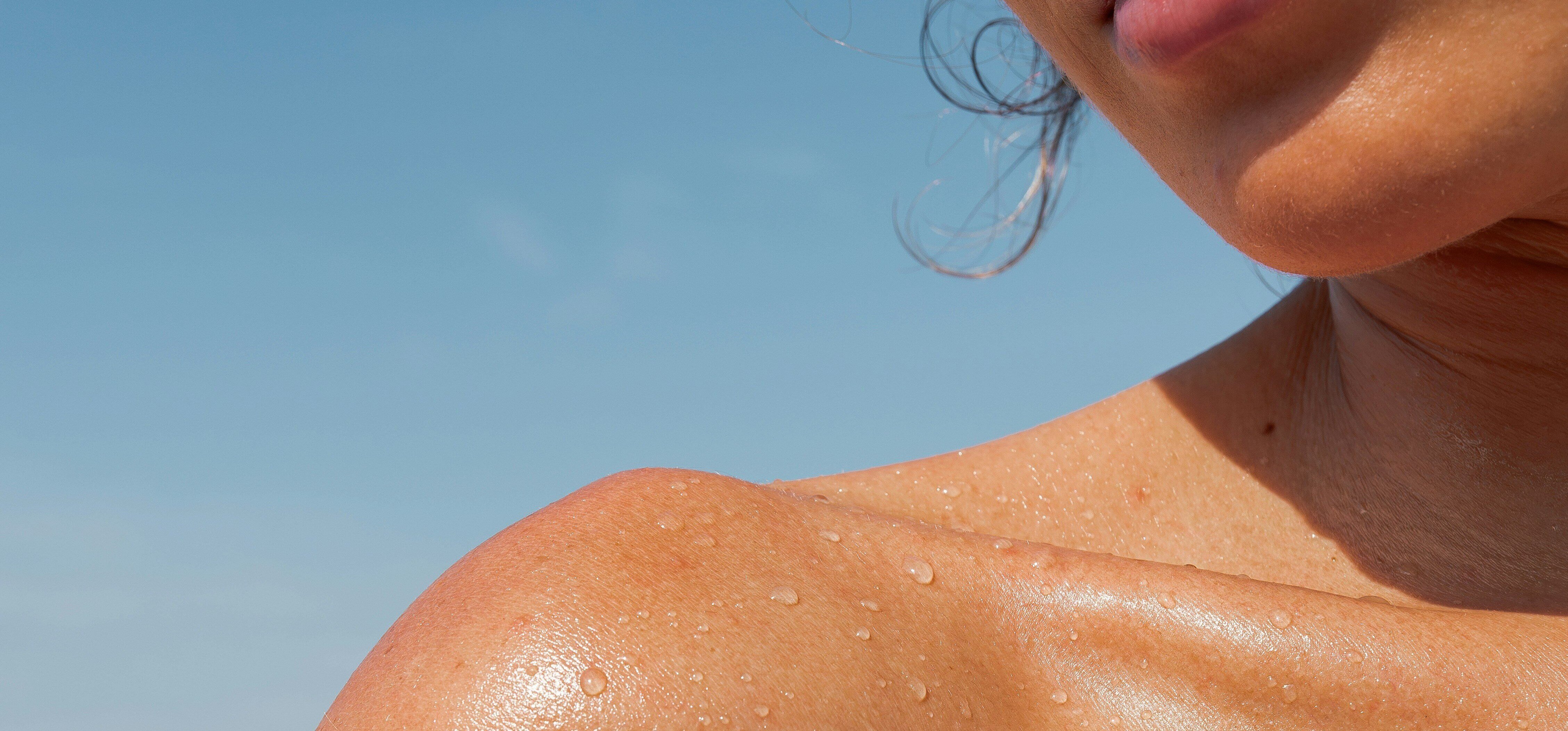 Close-up of healthy skin under sunlight for skin care and health awareness